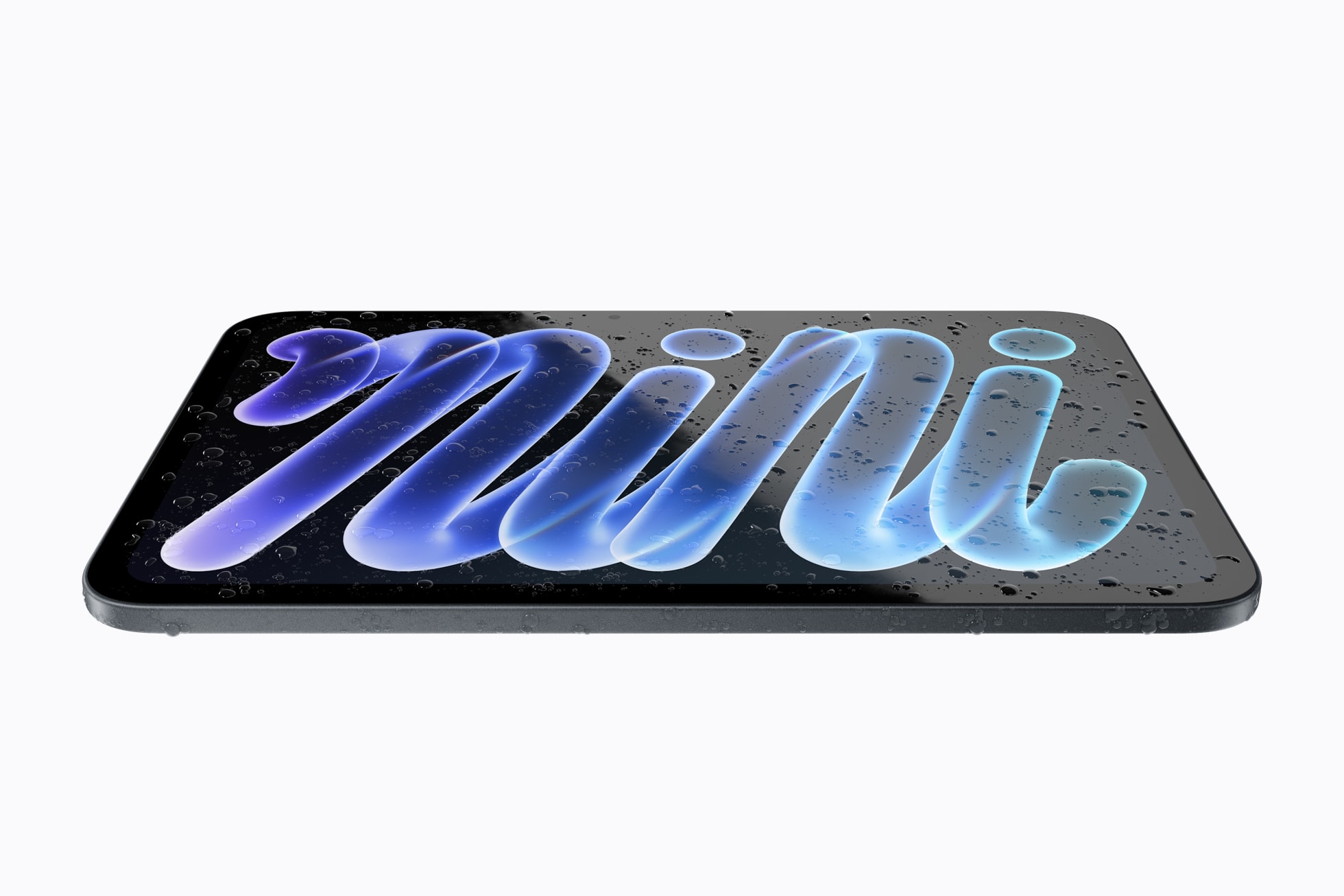 Flach liegendes iPad mini mit Wassertropfen auf dem Display